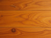 Photo-realistic image of TimberGlow All-Natural Stain on wood, showcasing enhanced grain, vibrant color, eco-friendly., vector, best quality, masterpiece