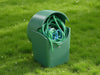 "Hose Harmony Pot, elegant garden hose storage, durable materials, tangle-free, seamless garden integration, charming design.", vector, best quality, masterpiece