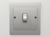 "FusionPlate Contemporary Toggle Switch Cover: sleek, modern design, premium materials, stylish room enhancement, durable elegance.", vector, best quality, masterpiece