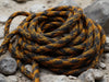 "UltraFlex Heavy-Duty Cinch Rope: robust, versatile, weather-resistant, flexible, high tensile strength, secure, outdoor adventures", vector, best quality, masterpiece