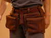 "RuggedCraft Carpenter's Utility Belt: high-quality, durable, adjustable, multiple pockets, loops, comfort, functionality, woodworking professionals", vector, best quality, masterpiece