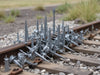 "RailGuard Plus Spikes: High-strength, durable railroad spikes; secure tracks, resist bending, reliable steel construction.", vector, best quality, masterpiece