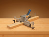 "UltraGuide Saw Jig System cutting wood effortlessly, precise alignment, carpentry, DIY, flawless straight cuts", vector, best quality, masterpiece