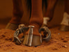 Create an image of 'Saddle Up with Reliable Horseshoe Nails', featuring durable nails securing horseshoes on horses., vector, best quality, masterpiece