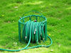 Create an elegant garden scene showing the Hose Nest Organizer, stylishly coiled hoses, organized, decorative, durable., vector, best quality, masterpiece