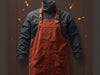 "FlameGuard Welding Apron: durable, heat-resistant, stylish design, maximum coverage, adjustable straps, pockets, reinforced stitching", vector, best quality, masterpiece